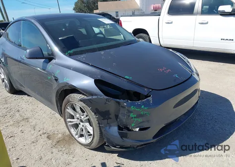 2023 Tesla Model Y Awd/Long Range Dual Motor All-Wheel Drive z USA, uszkodzony, nr VIN 7SAYGAEE1PF769999